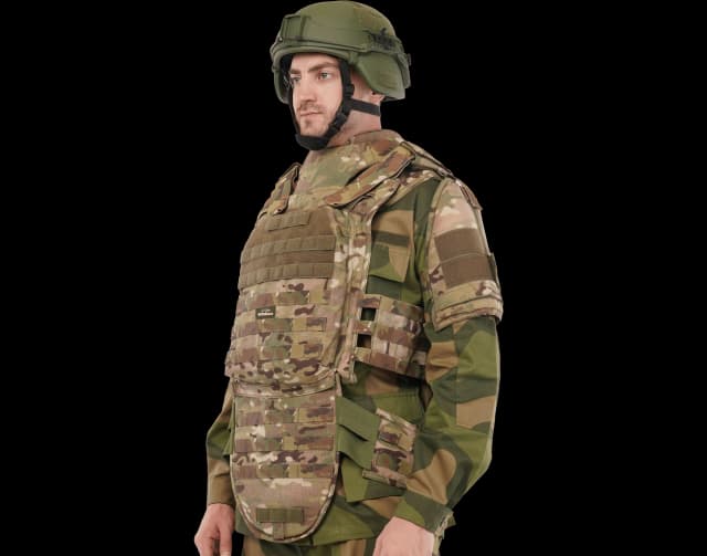 Soldier wearing Hard Shell Saviour Vest in camouflage with helmet, full-body protection