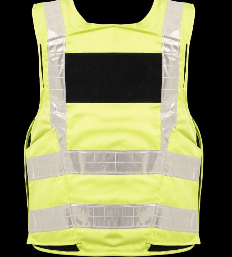 Back view of a Hi-Viz Jacket with reflective silver strips and a black patch, designed for enhanced visibility and safety.