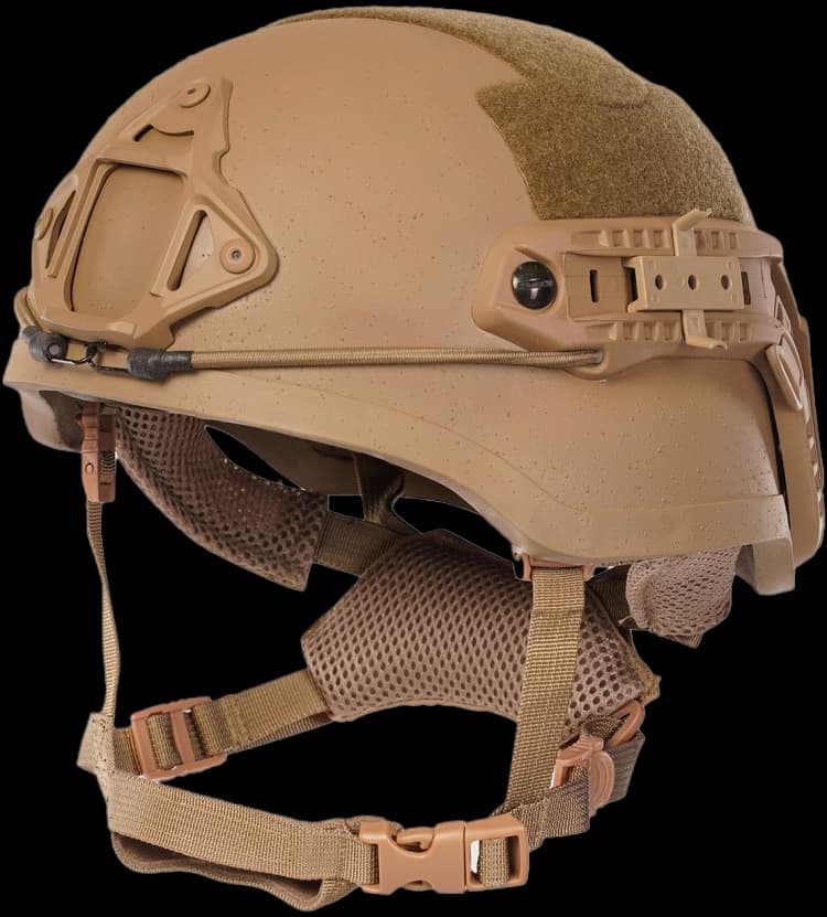 Tan mid-cut tactical helmet showing side rails, padding, chin straps, and mount points in close detail.