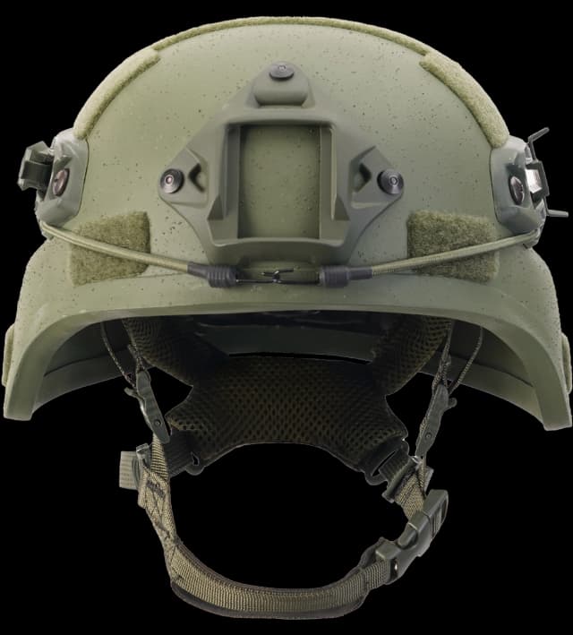 Front view of green MICH ballistic helmet showing NVG mount, Velcro pads, and chin strap.
