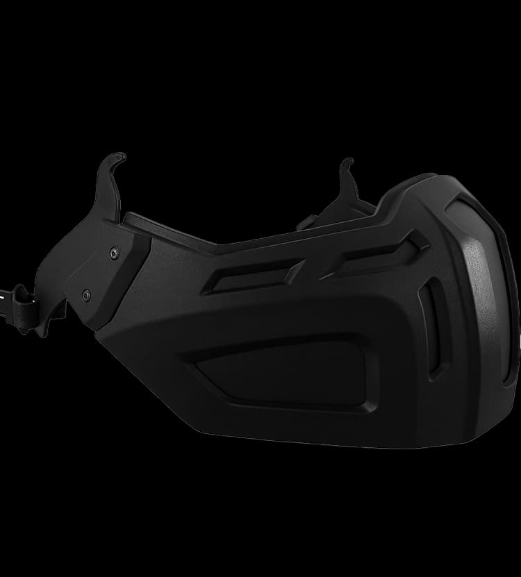 Right-side angled view of black helmet-mountable mandible guard with textured protective panels.
