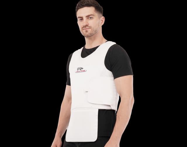 Model wearing a white Hard Shell concealable vip vest designed for concealed protection and lightweight body armor comfort.