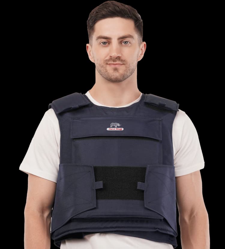 Front portrait of man wearing Hard Shell General Purpose Defender Vest designed for police and security personnel.