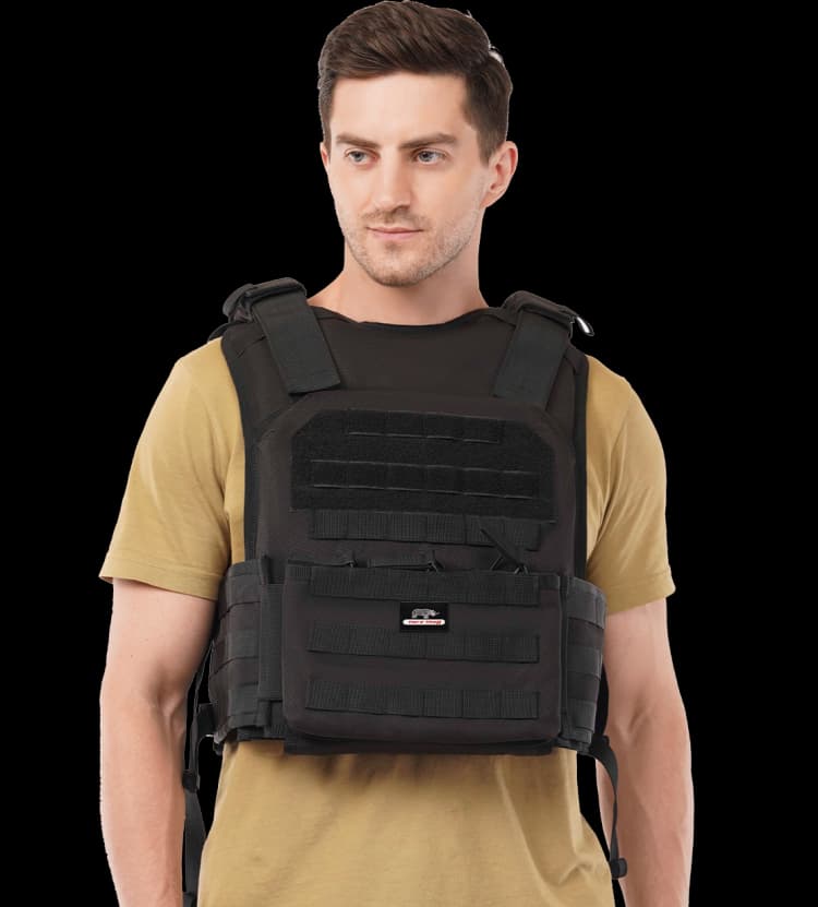 Man wearing Hard Shell Active Shooter Plate Carrier, displaying front protection panel and tactical design.