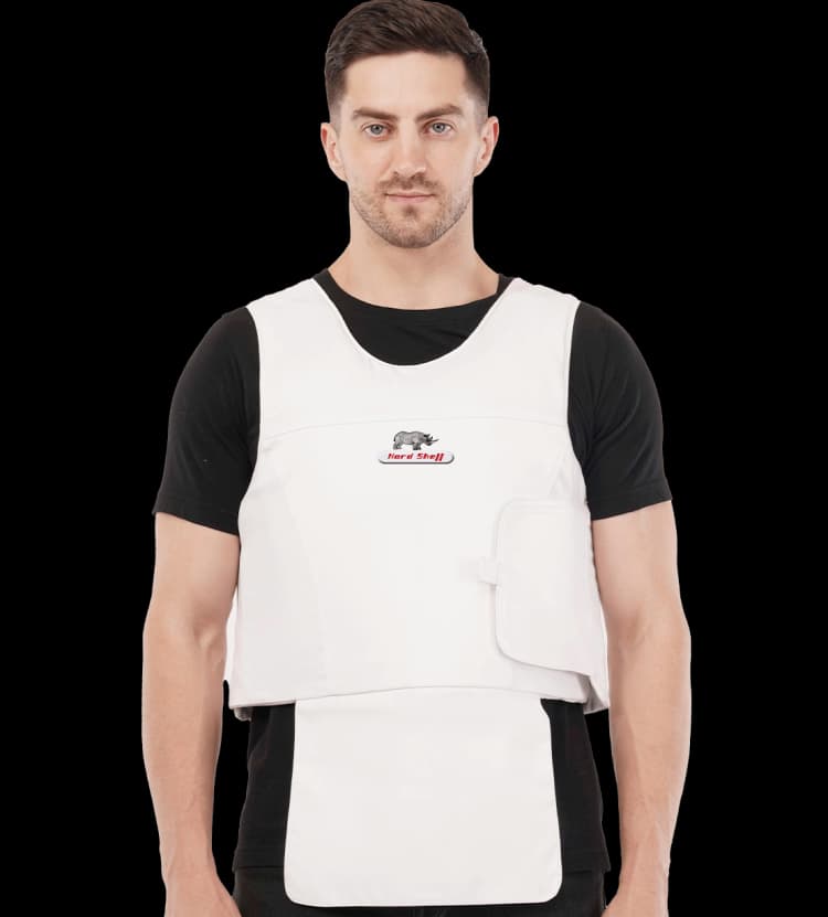 Model wearing Hard Shell white concealable vip vest with groin protector, designed for concealed body armor and full front protection.