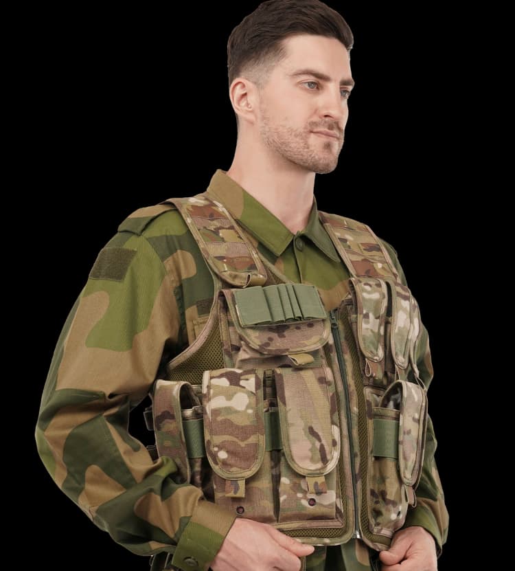 Camouflage Hard Shell Assault Vest with front zipper, shoulder loops, and quick-access gear pouches.