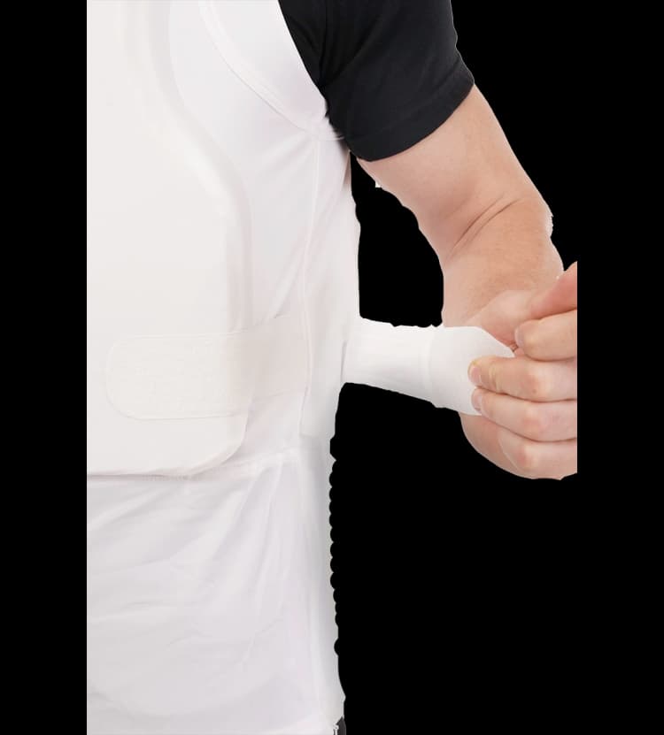 Close-up of Hard Shell vip undervest showing adjustable side straps for a secure, custom fit.