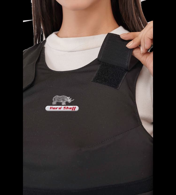 Close-up of Hard Shell Vixen Vest showing adjustable shoulder strap for a secure and comfortable ballistic fit.