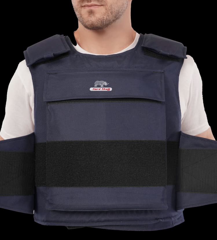 Close-up of Hard Shell General Purpose Defender Vest showing wide Velcro waist straps for adjustable fit.
