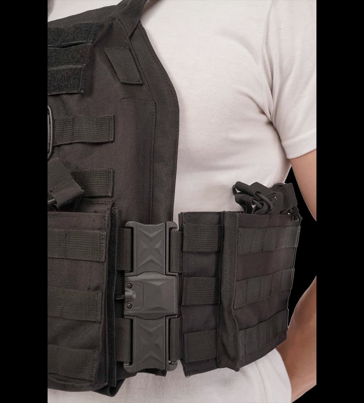 Close-up of Hard Shell TacSnap Plate Carrier side buckle and modular pouch attachment system.