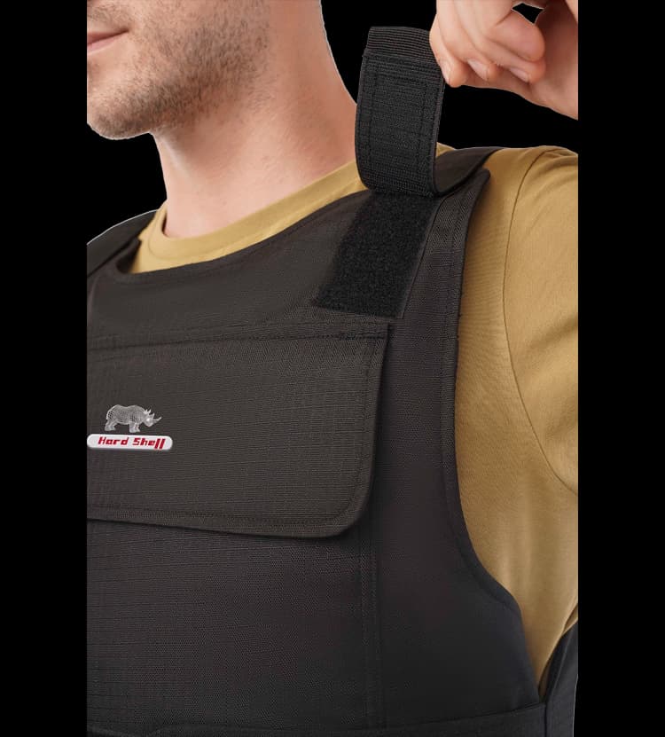 Close-up of Hard Shell vest shoulder strap adjustment for comfortable and secure body fit.