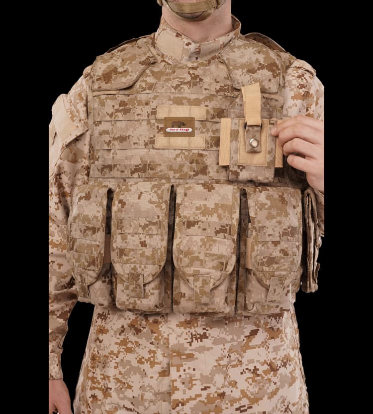 Close-up of Hard Shell PullTac Quick Release Vest with soldier adjusting front utility pouch.