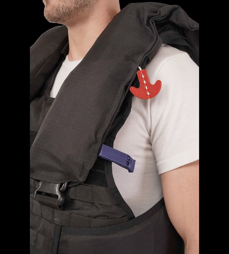Detailed view of Hard Shell Tactical Marine Vest flotation collar with manual activation pull tab.