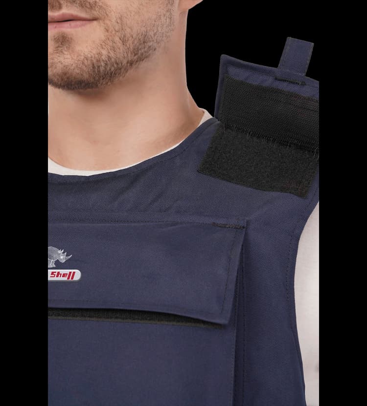 Close-up of Hard Shell General Purpose Defender Vest showing shoulder strap adjustment for custom comfort.