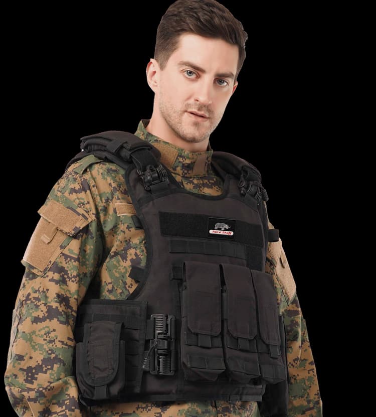 Man wearing Hard Shell Rhino Tactical Vest in black with modular pouches and quick-release buckles for military protection.